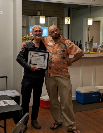 Christopher Yermal with Jonathan Schleier after receiving the Certificate of Appreciation at the Members' Night 2024